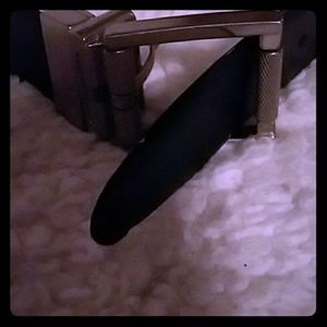 Black leather belt with silver buckle